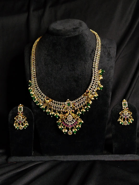 South Indian Temple Jewellery With Lakshmi Pendent and full of CZ with Green Beads in Antique Gold Polish